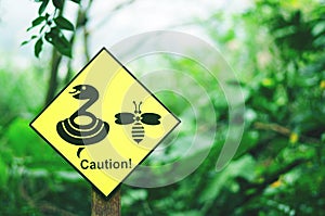 Yellow caution sign, nature danger