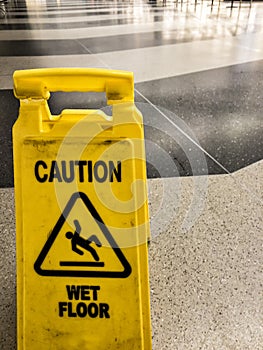 Yellow Caution wet floor sign