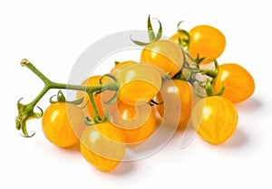 Yellow cherry tomatoes on a twig