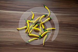 Yellow chilli on the table view from above