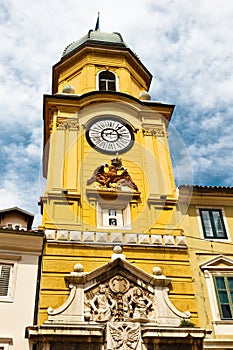 Yellow Clock Tower with Relief in Rijeka photo
