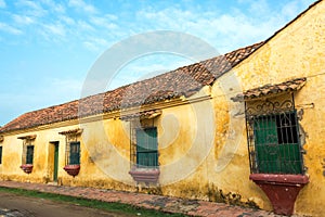 Yellow Colonial Building photo