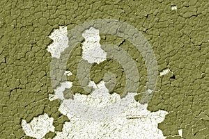 Yellow color cracked painted wall pattern.