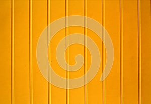 Yellow color plastic siding surface