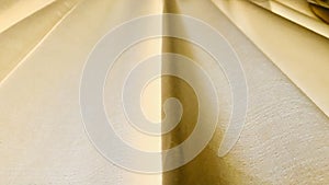 Yellow curtain texture and background. low angle view.