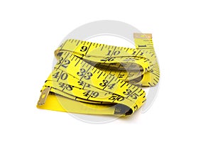 Yellow colour measureing tape on white background