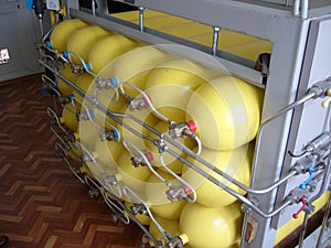 Yellow compressed natural gas cylinders