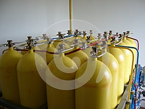 Yellow compressed natural gas cylinders