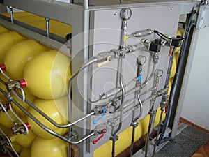 Yellow compressed natural gas cylinders photo