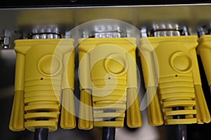 Yellow computer video VGA cables on KVM panel close up photo