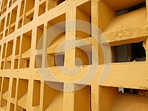 yellow concrete roster ventilation wall