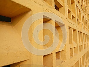 yellow concrete roster ventilation wall