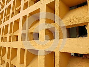 yellow concrete roster ventilation wall