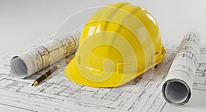 Yellow Construction Helmet on Architectural Blueprints