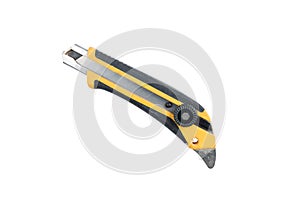 Yellow construction scalpel isolated on a white background. Construction tool and equipment. Path saved.