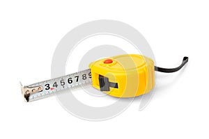 Yellow construction tape measure isolated on white.