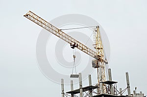 Yellow construction tower crane