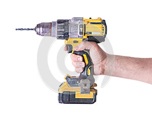 Yellow cordless battery powered drill .