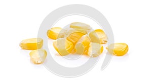 Yellow corn grains on white background