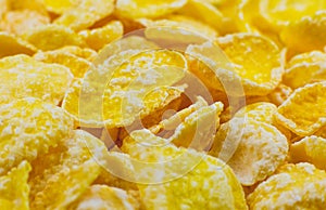 Yellow Cornflakes close up photo, Food texture background, top view. Macro shot. Perfect breakfast