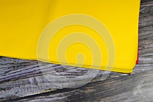 Yellow cover for booklets, brochures and books, wrapping the coverage on books, back to school concept, school supplies and