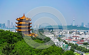 Yellow crane tower and Wuhan Yangtze Great Bridge scenic view in photo