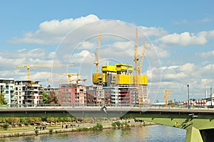 Yellow cranes on site in Frankfurt city