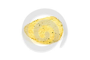 Yellow crispy ridged potato chips on white background