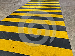 Yellow crosswalk. Yellow crosswalk painted lines close up