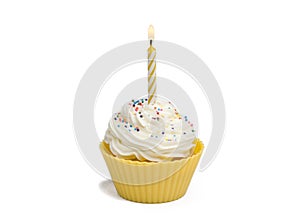 Yellow cupcake and candle