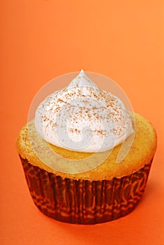 Yellow cupcake with vanilla frosting