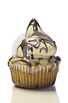 Yellow cupcake on white background