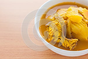Yellow curry with fish and papaya