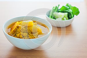 Yellow curry with fish and papaya with fresh vegatable