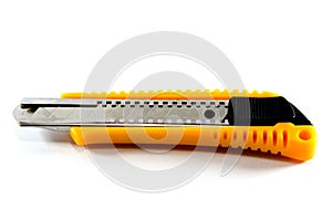 A yellow Cutter knife.