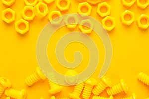 Yellow 3d printed bolts and nuts