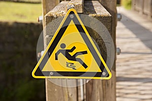 Yellow danger of slipping sign