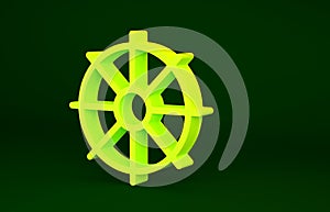 Yellow Dharma wheel icon isolated on green background. Buddhism religion sign. Dharmachakra symbol. Minimalism concept