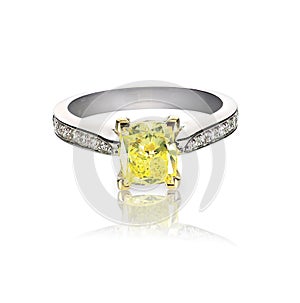 Yellow diamond colored engagement ring isolated on white