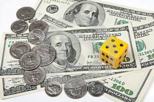 Yellow dice and money