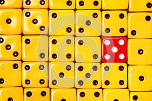 Yellow dice and one red dice. Clous-Up. Object of gambling, poker, and board games. Design