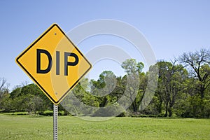 Yellow DIP Sign in a Green Landscape, Blue Sky