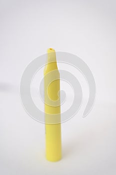 yellow disposable electronic cigarette on white background. Copy space