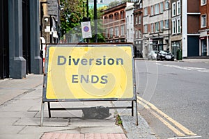 Yellow Diversion Ends road sign in a UK city street photo