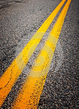 Yellow dividing lines on the highway