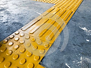 Yellow Dome and Block of Tactile Paving Which Act as A Guidance for Visually Impaired or Blind Citizen To Avoid Hazard