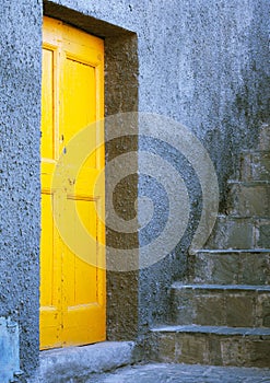 Yellow door in Cinque terre in Italy