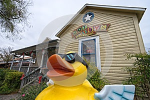 Yellow duck statue in front of store in Gruene Texas