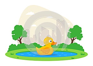 yellow duckling swims in the pond in the park. animals in nature.