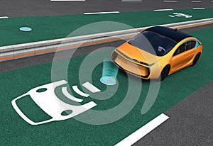 Yellow electric car on EV wireless charging lane